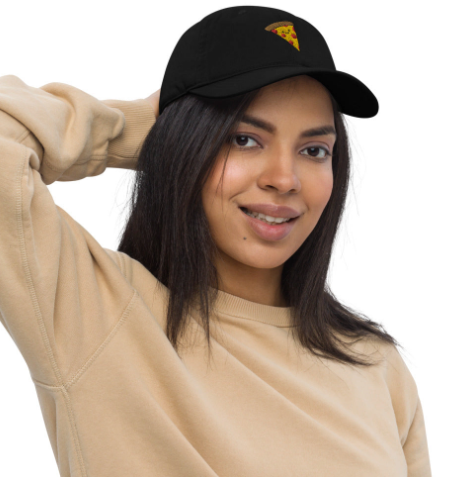 A side view of the organic cotton dad hat worn my model, highlighting the quality twill fabric and comfortable, unstructured shape.