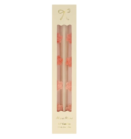 A set of two 11-inch floral sculptural candles designed for sophisticated table settings and fireplace mantels.