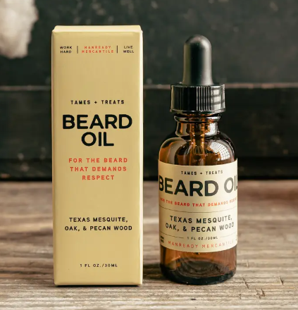 Manready Mercantile Tan Label Beard Oil in a 1 fl oz amber glass dropper bottle with Texas Mesquite fragrance notes.