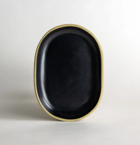 Add a pop of coastal elegance to your home with the handcrafted Brookline Small Tray by Emerson Creek Pottery in rich Blackberry.