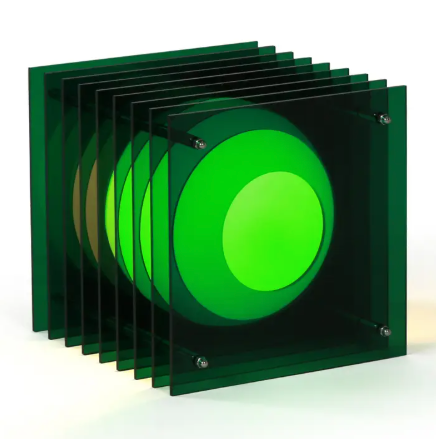 A rich green edition of the LớP Small Square Light by BANG, showcasing its mesmerizing multi-layered reflections.