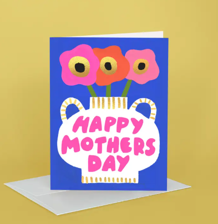 A beautiful Mother's Day card by Idlewild Co. featuring a hand-painted floral bouquet in a blue and white patterned vase.
