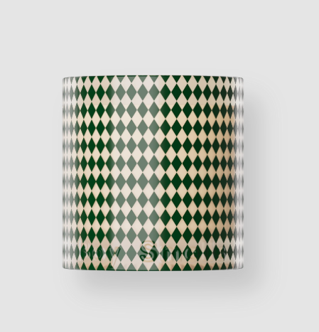 The Boy Smells Xxmas Tree candle in its green and cream checkered holiday vessel.