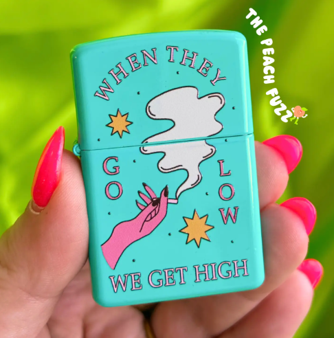 When They Go Low Lighter by The Peach Fuzz, showcasing the unique design and refillable feature.