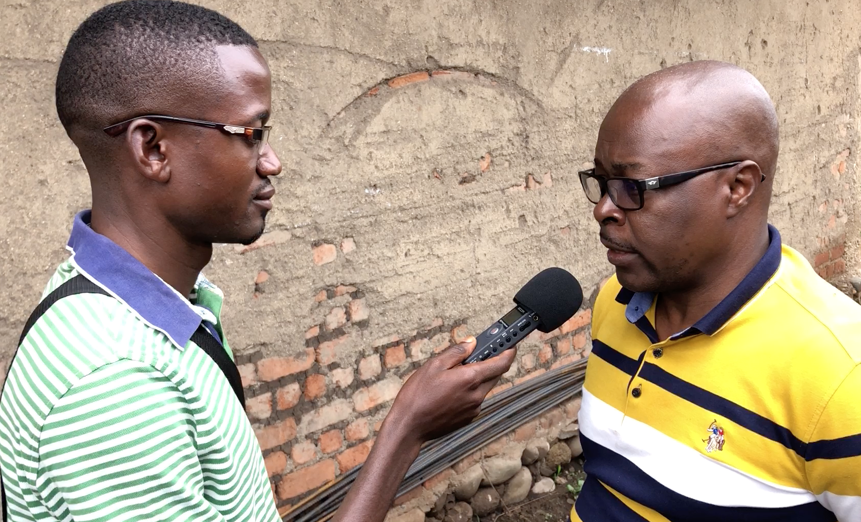 Hon Albert Baliesima, MP for Beni Territory being interviewed by Baraka Bacweki from Umoja FM in Nobili