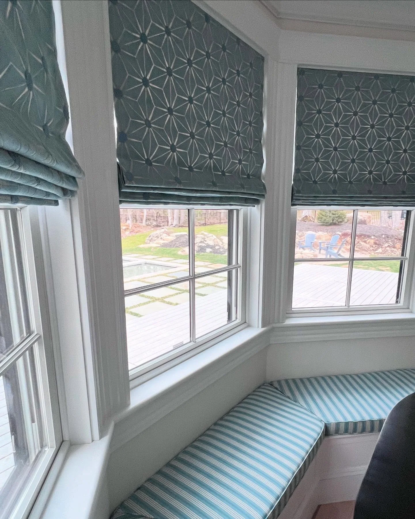 We loved bringing this bay window to life with custom Roman shades in a fun geometric, and a tailored striped cushion. Cozy, elevated, and made just for this space 
.
.
.
.
.
#fabrics #fabricshowroom #wallpaper #customdesigns #customwindowtreatments 