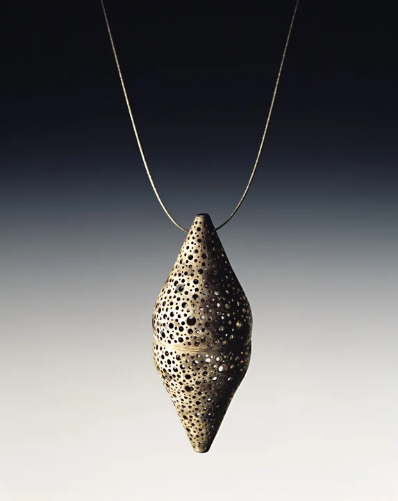 Perforated Capsule Pendant
