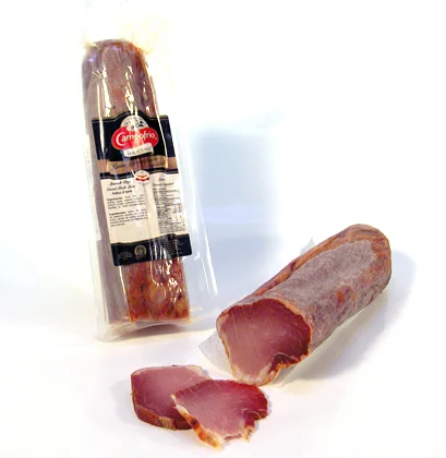 Lomo Embuchado (Pieza Entera)/ Dry Cured Pork Loin (Whole Unit). Lomo is a dried-cured pork loin and is traditionally served in thin slices. Campofrio lomo embuchado is seasoned with sea salt, pimentón, and garlic and then cured. Compared to many of the meats and embutidos that we carry, this lomo is probably one of the leanest. For this reason, lomo is a great contrast to some of the fattier embutidos that a good charcuterie assortment should have. The light pink color and lightly salted flavor make it easy to enjoy and it pairs nicely with Manchego cheese and a glass of Tempranillo. Because this is the entire piece of lomo embuchado, you`ll have to slice it yourself (we also offer pre-sliced if that`s what you prefer). SPECIFICATIONS: Each package is vacuum sealed. Approximate weight: 1.00 Lb Imported from Spain. Due to the artisanal nature of this product, weight will vary from unit to unit. We will weigh and charge for this product at the time of shipping.
