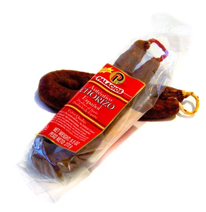 Mild Dry-Cured Chorizo This dry-cured chorizo is manufactured in La Rioja, Spain and was the first dry-cured chorizo product to be imported into the US. It is made with sweet Pimenton de la Vera and is ready to be sliced and eaten. This chorizo is all-natural with no artificial preservatives. TASTING NOTES: You will taste a delicate balance of spices, garlic and smoked paprika. We recommend serving this chorizo with wine and cheese, or with fresh bread. This dry chorizo is also available in a spicier version, Picante, if you prefer spicy flavors. SPECIFICATIONS: Each package contains 1 U-shaped dry-cured link. Weight: 150 grams Imported from Spain.