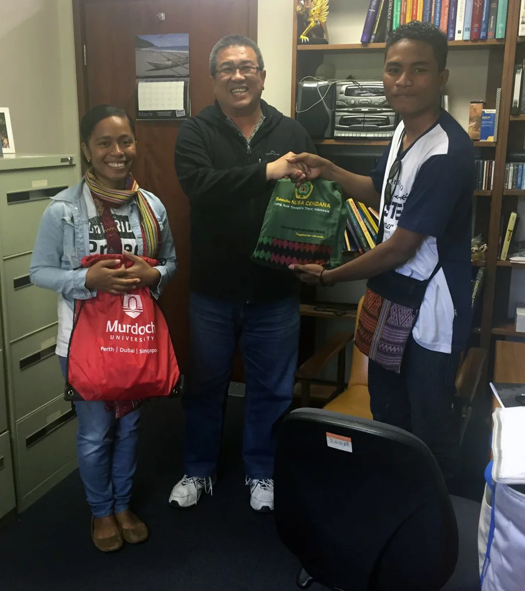 Exchanging gifts with Pak Irianto at Murdoch University in Perth