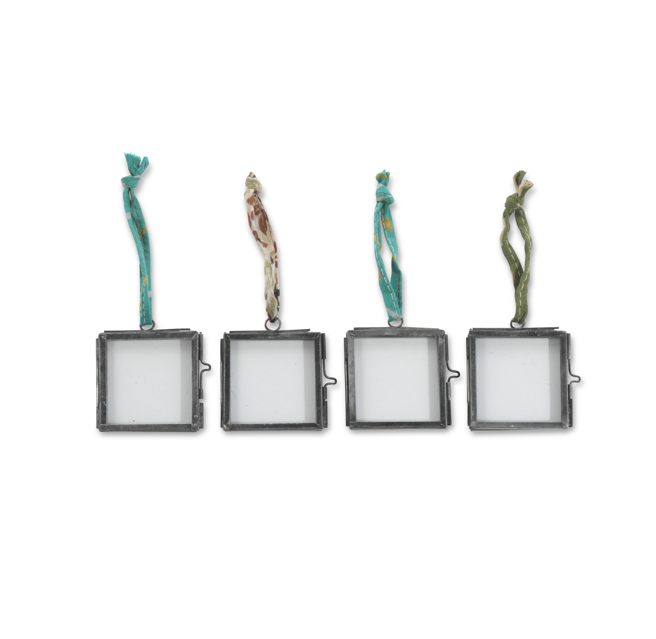 These lovely little zinc frames will look so good filled with photographs. How about pictures of grandchildren given to the grandparents to hang on their Christmas tree! www.alittlebitofnice.com