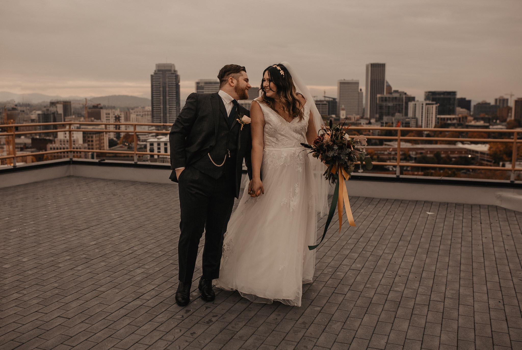  downtown portland rooftop first look on wedding day 