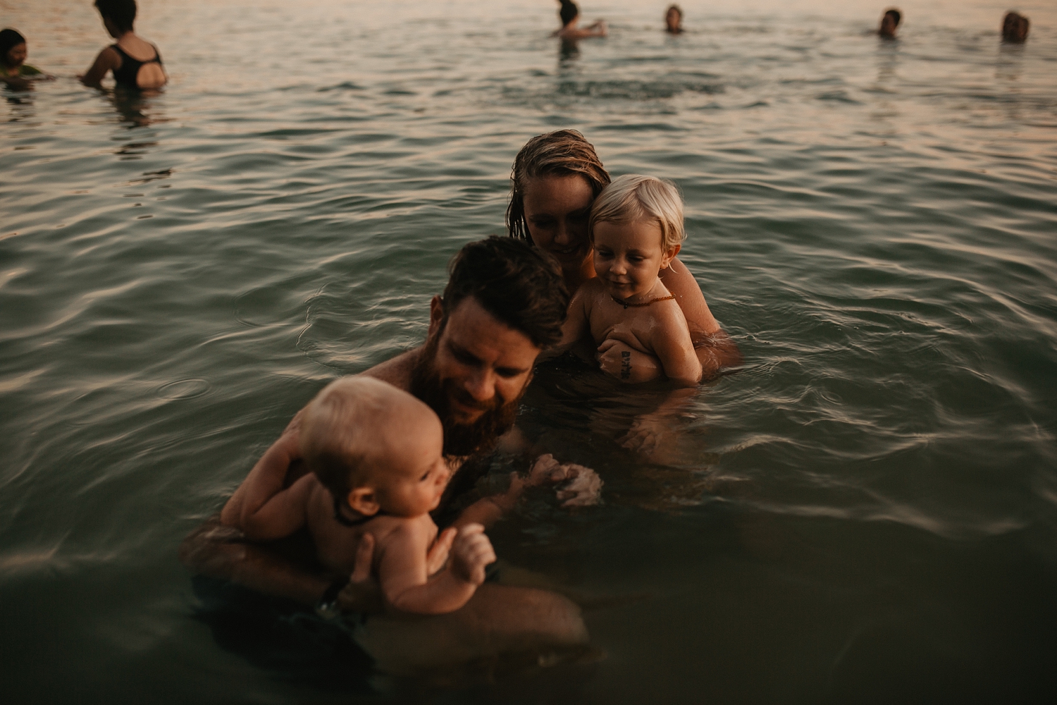  Family swim session in a Phuket Thailand private bay. 