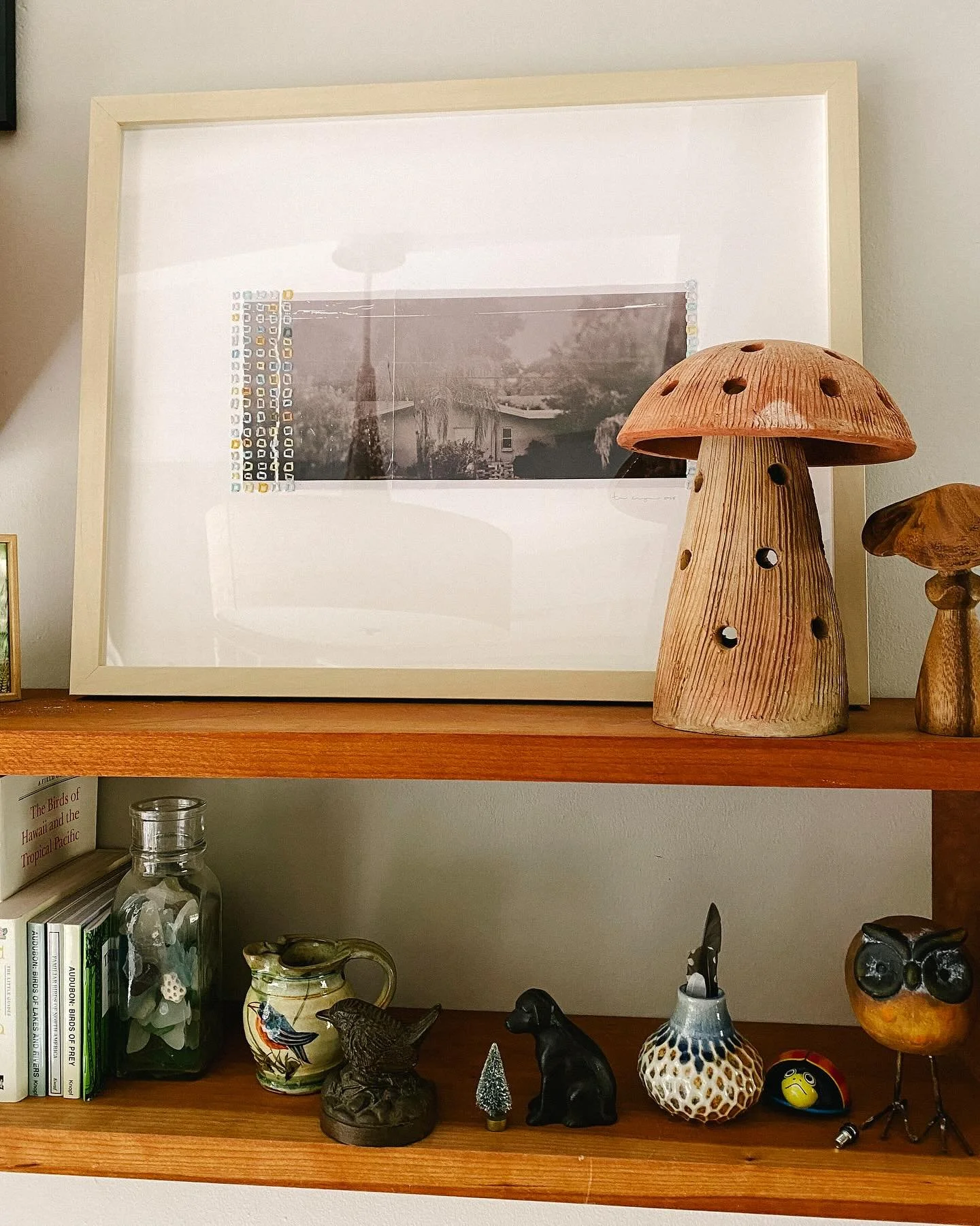 &ldquo;It Beckons Me&rdquo; has found her forever home nestled on this shelf of trinkets, including a @heniseepottery bud vase. Thank you, Maggie for bringing her home 🧡

#embroideryart #colorfulthreads #chestercountyartist #blackandwhitephotography