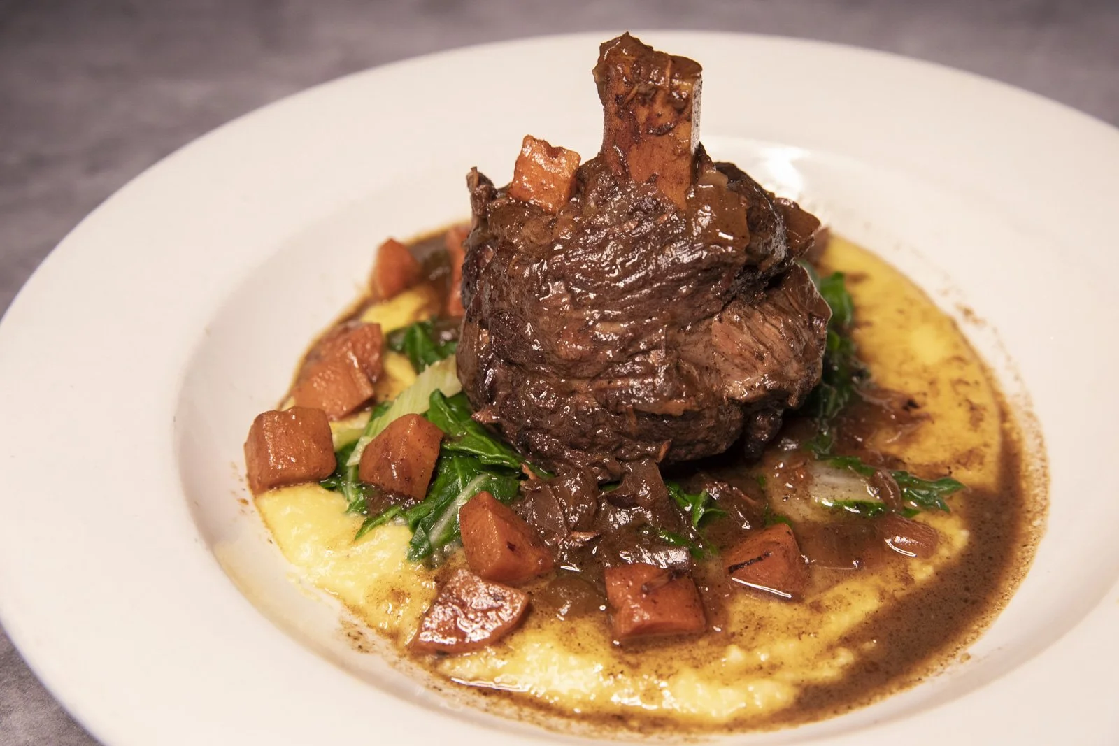 Sottocoste - Pin wheel, slow braised beef short ribs, Sangiovese wine polenta Taragna & winter greens