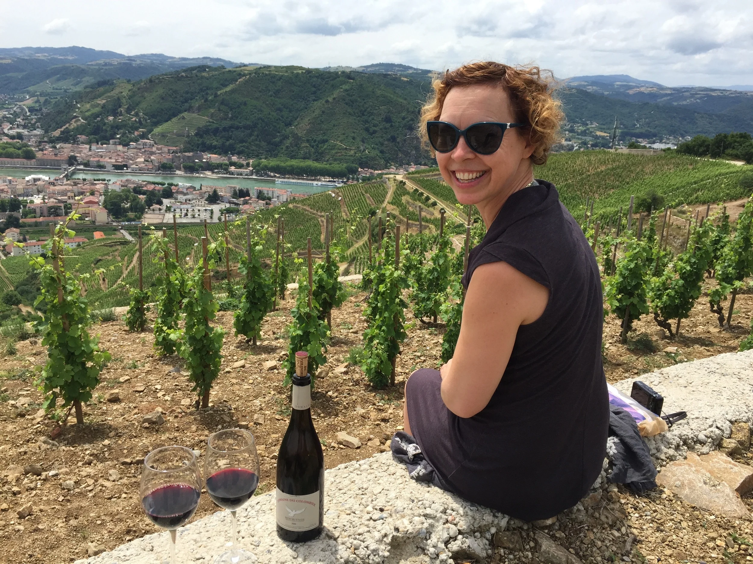 Enjoying a picnic on top of Hermitage with a bottle of Hermitage