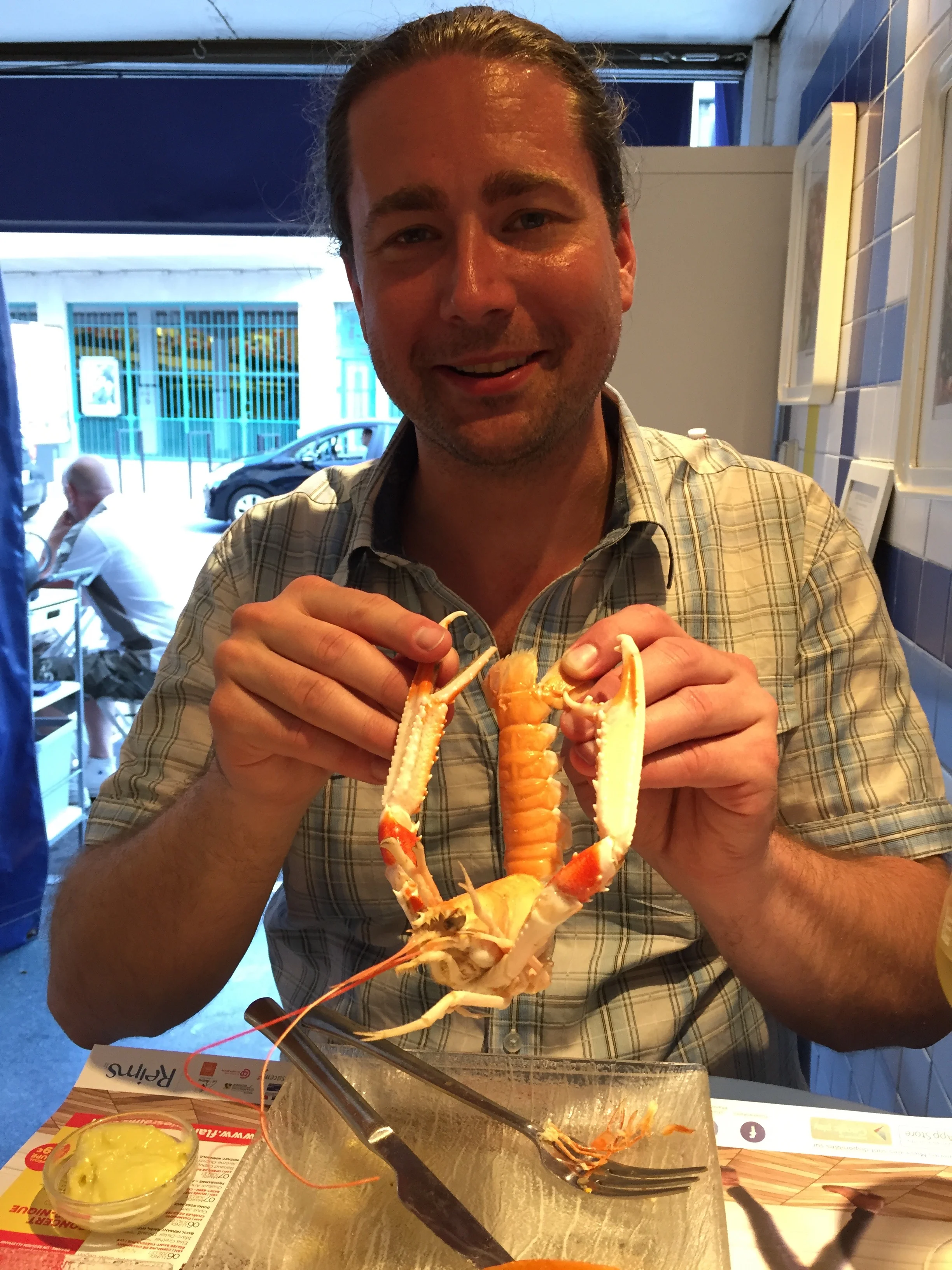 Me with a langoustine at Le Bocal in Reims, absolutely nothing to do with this post.