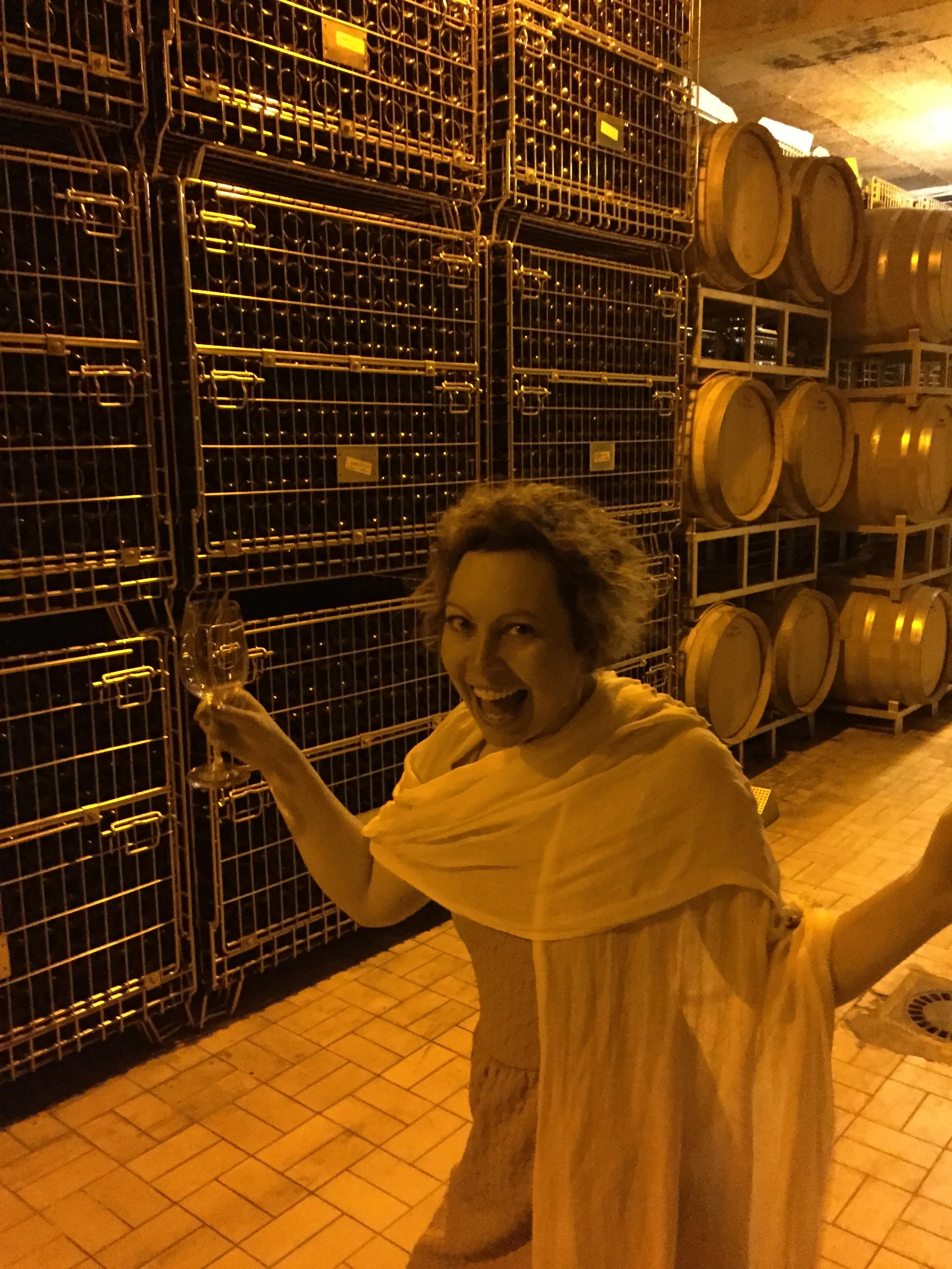 Kristin was excited to be in the cool, dark cellar after the heat outside.