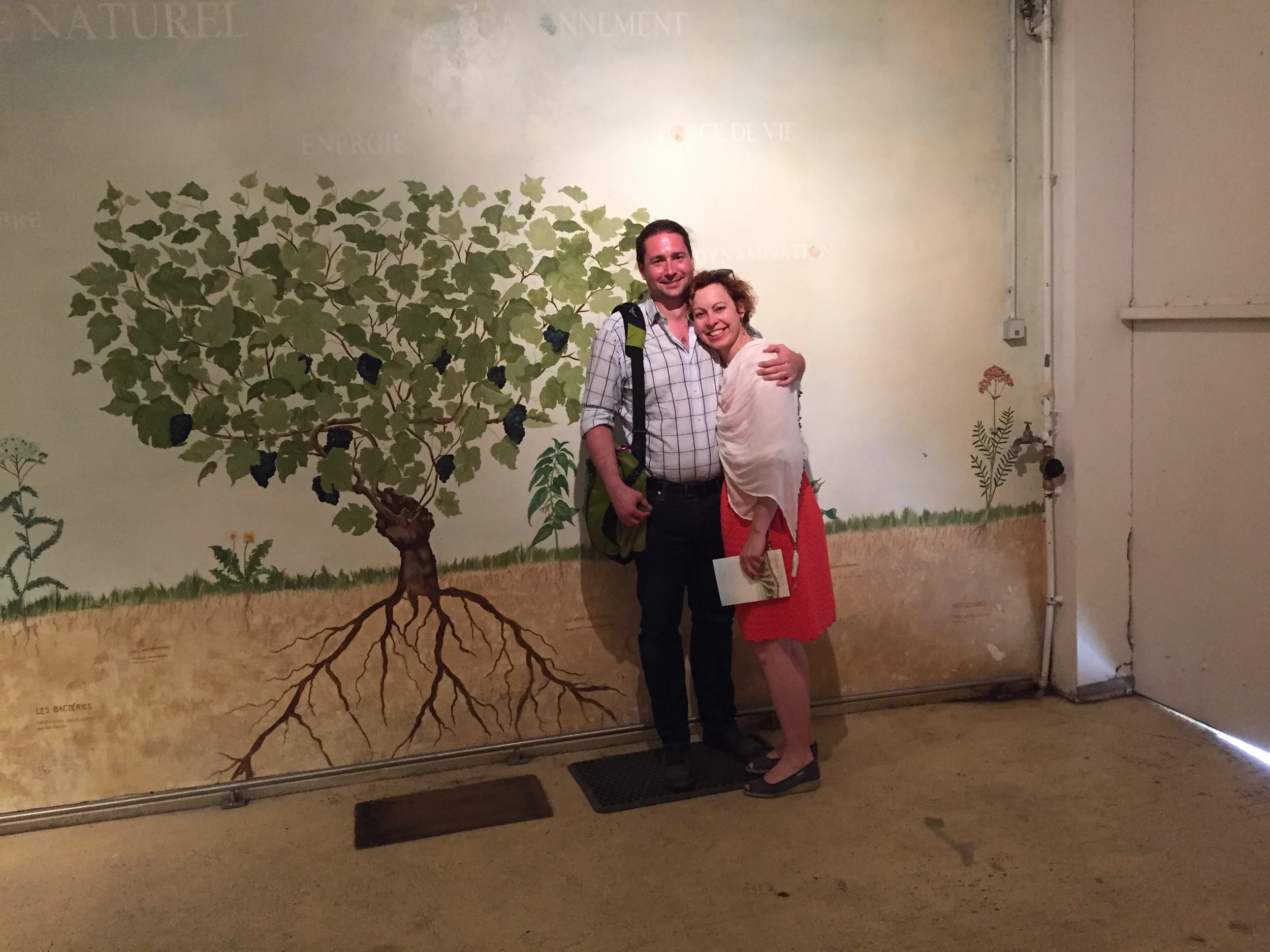 Kristin and I in front of Mignon's core values sign.