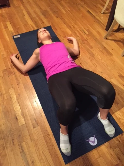 Lay on a foam roller the long way down your spine with your knees bent and feet on the floor. Place both arms at a 90 degree angle and try to get your elbows and forearms to touch the ground while keeping your lower back flat against the foam roller. This is a good stretch to have someone gently press down on your elbows to open up your chest and shoulder muscles even more. 
