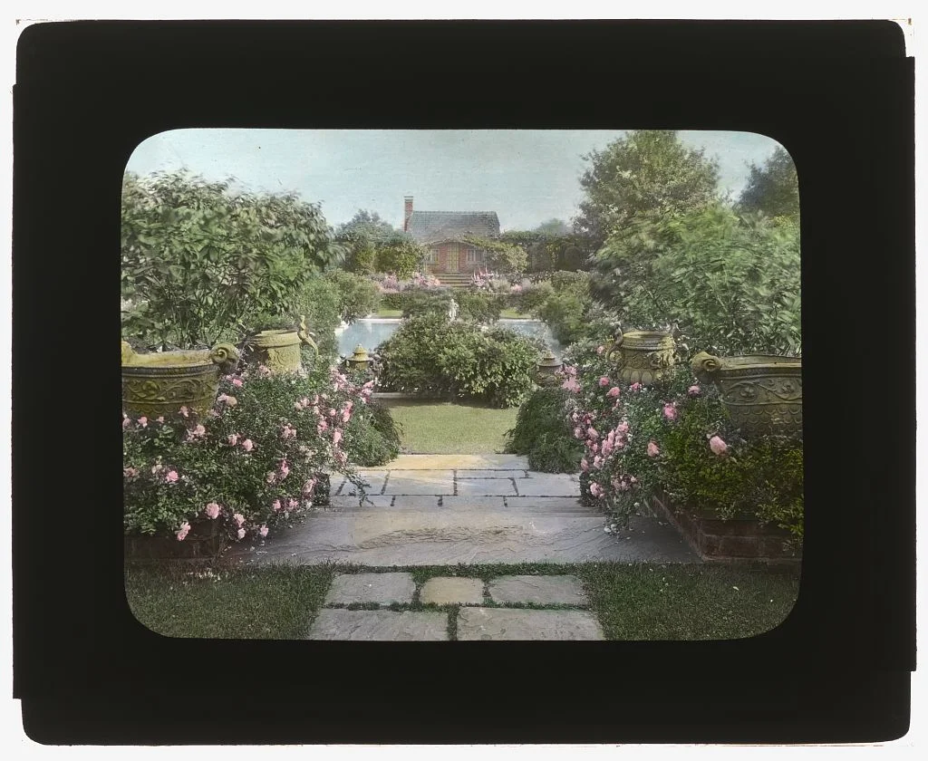 Photography by Frances Benjamin Johnston of "Planting Fields" William Robertson Coe house, 1395 Planting Fields Road, Oyster Bay, New York. View to Blue Pool Garden and tea house. 1926. Library of Congress. ppmsca 16975 http: //hdl.loc.gov/loc.pnp/ppmsca.16975