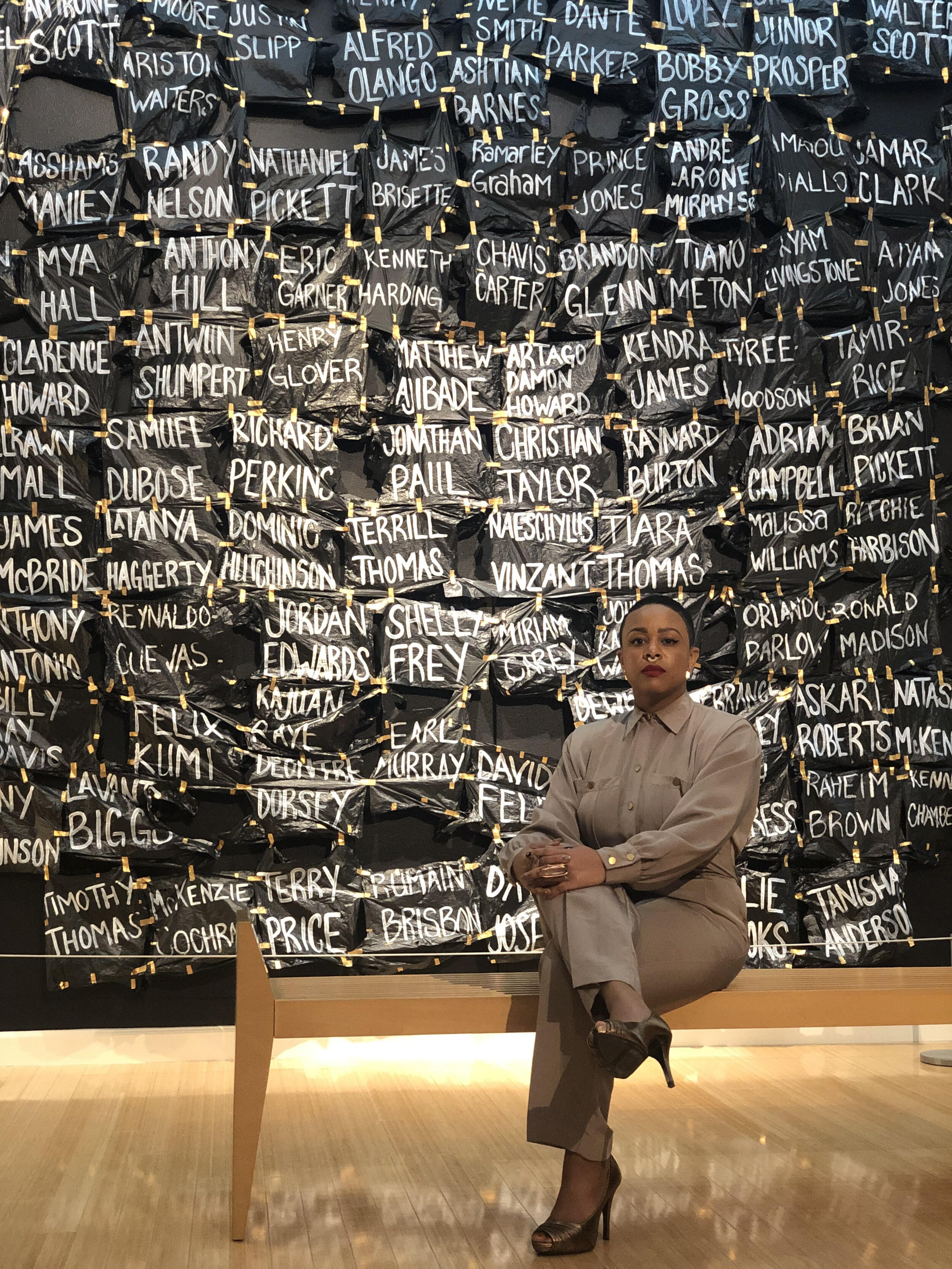  Taja Lindley,&nbsp; This Ain’t a Eulogy: A Ritual for Re-Membering | Ancestral Name Installation &nbsp;(image of site-specific installation and the artists), plastic bags, duct tape, and acrylic paint identifying the names of unarmed Black people ki