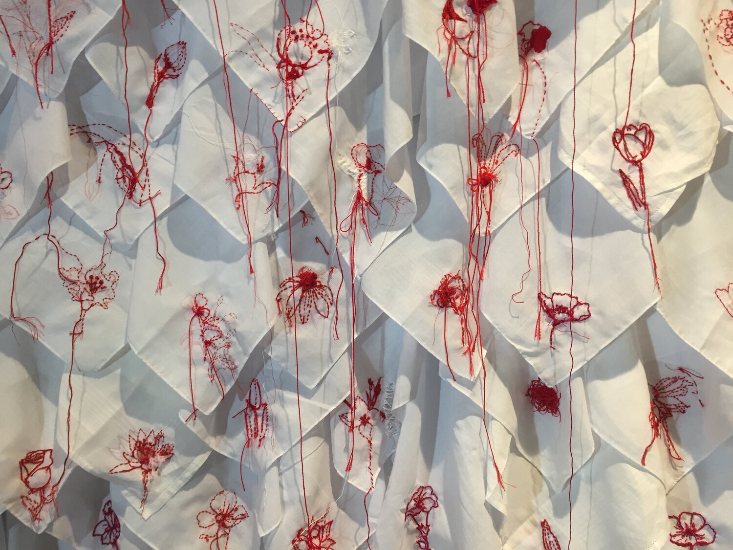 Carmen+Flores,+Gone+(detail),+2019,+red+colored+pencil,+thread+and+graphite+on+handkerchiefs,+dimensions+variable,+Loan+Courtesy+of+the+Artist.jpg