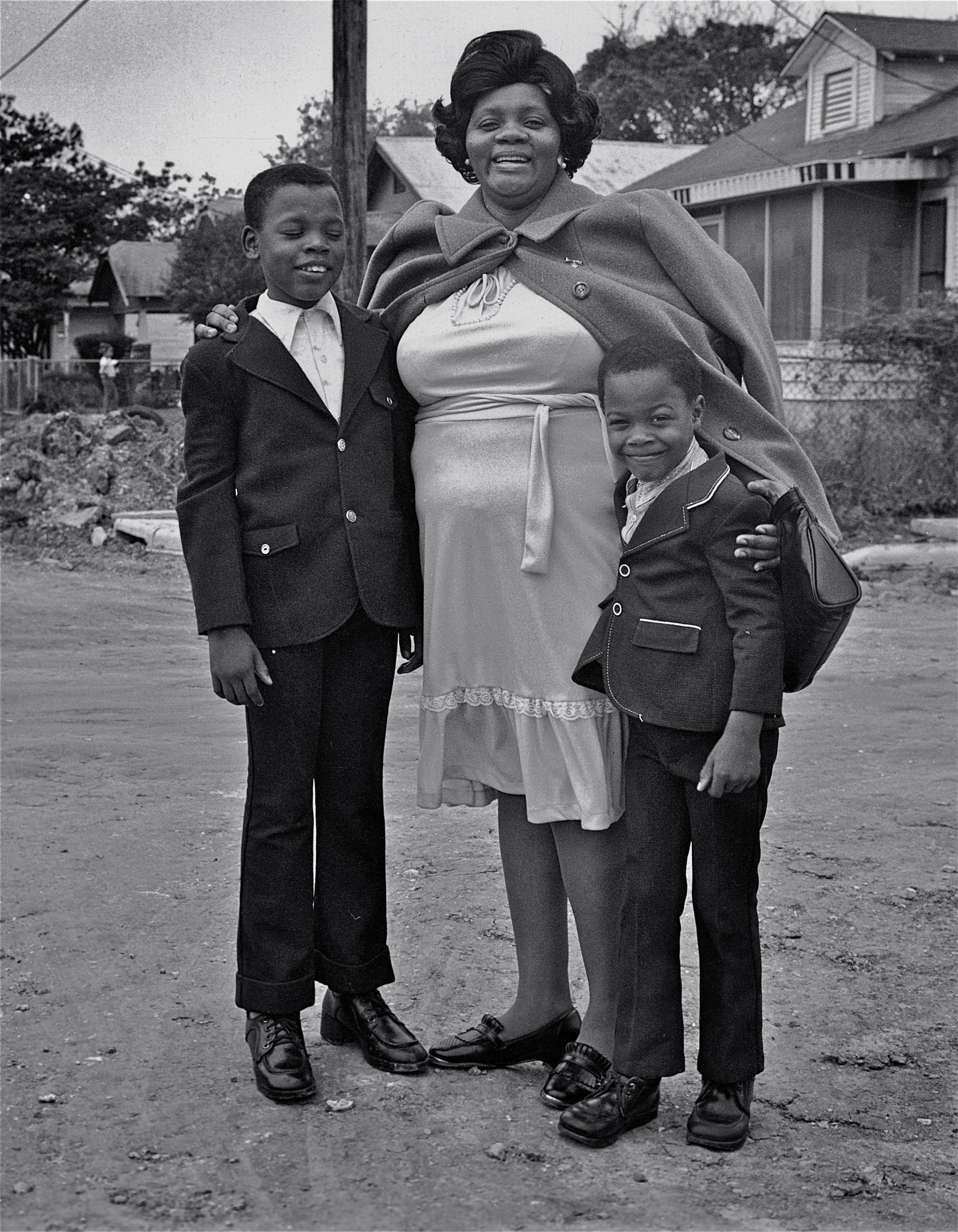  Earlie Hudnall, Jr.  Mother and Sons, Third Ward, Houston, Texas , 1973 Gelatin silver print. Image courtesy of the artist and PDNB Gallery 