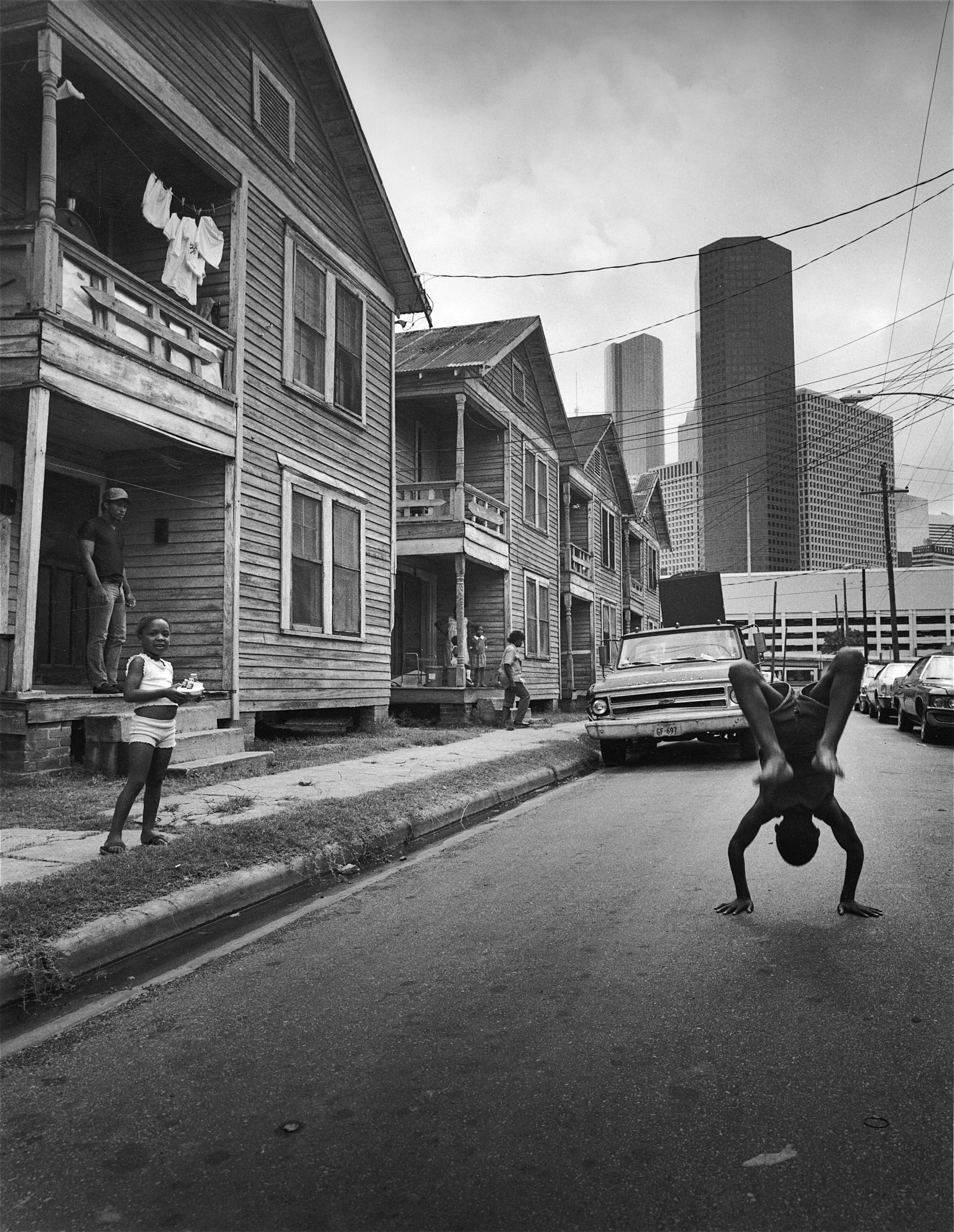  Earlie Hudnall Jr.,  Flipping Boy, Fourth Ward, Houston, Texas , 1983 Gelatin silver print. Image courtesy of the artist and PDNB Gallery 