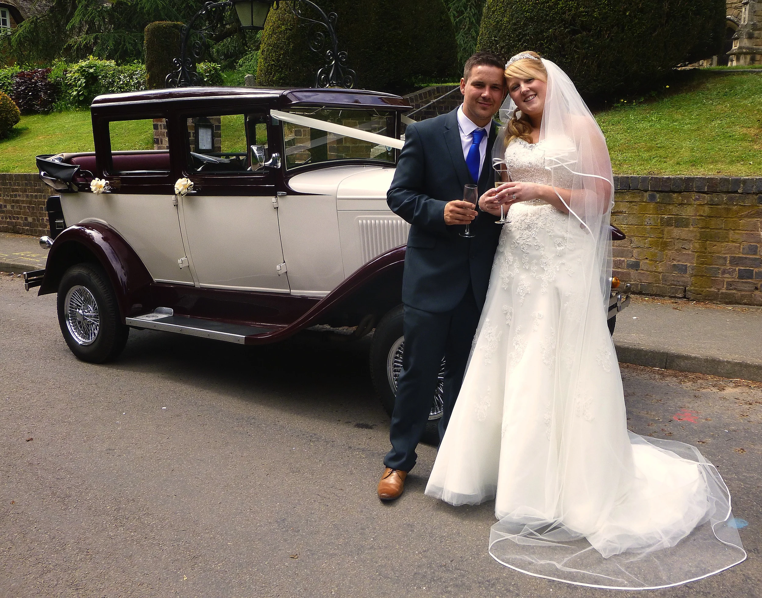 Katie and Michael enjoying the toast, following their wedding at St John the Divine Church, Shenton, Market Bosworth