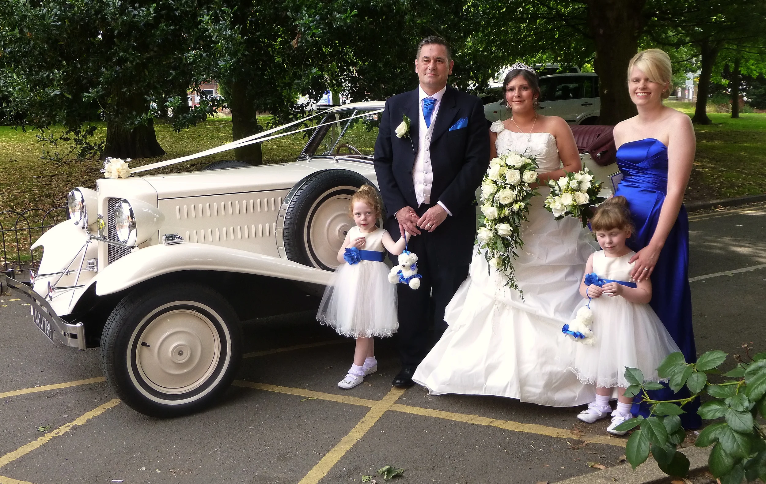 Toni arriving at the Riversley Park Registry Office, Nuneaton, for her marriage to Martin. Yet another beautiful day, enabling a longer drive through Nuneaton to the reception venue following photographs in the Park.