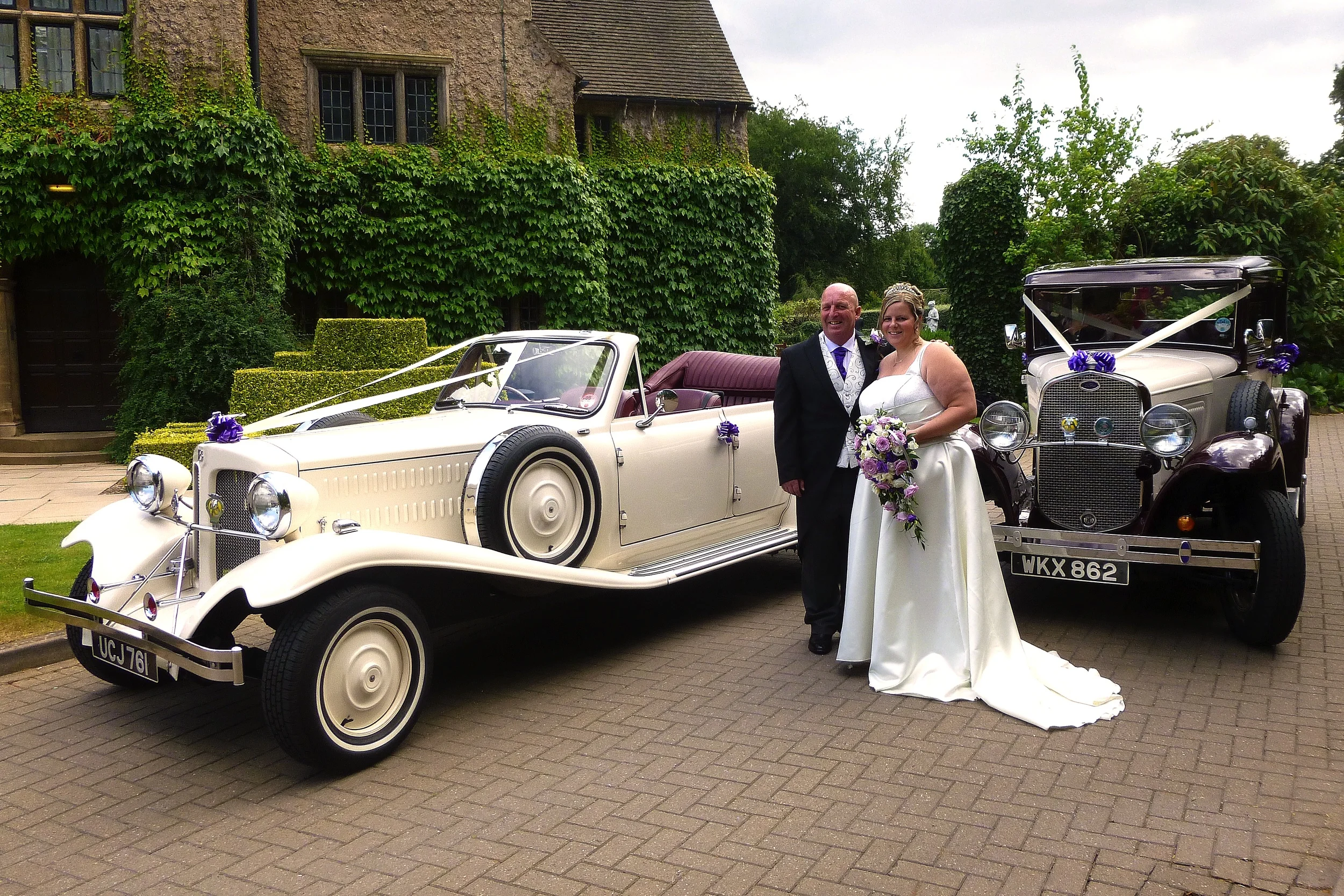 Tara and Maurice pause for photos by the cars at Quorn Grange, following a lovely "open top" drive around Quorn in the Beauford, 