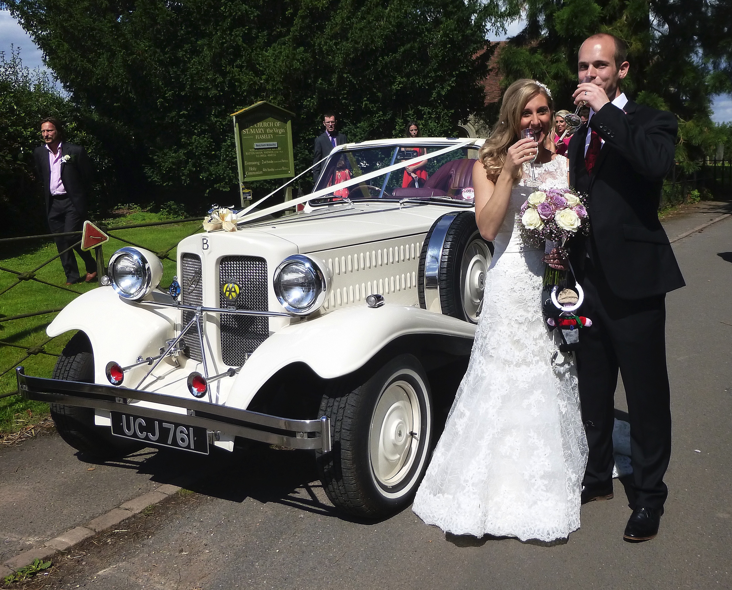 The couple enjoying a welcome sip of the "toast" we provide, prior to leaving for the reception venue at Ingon Manor.
