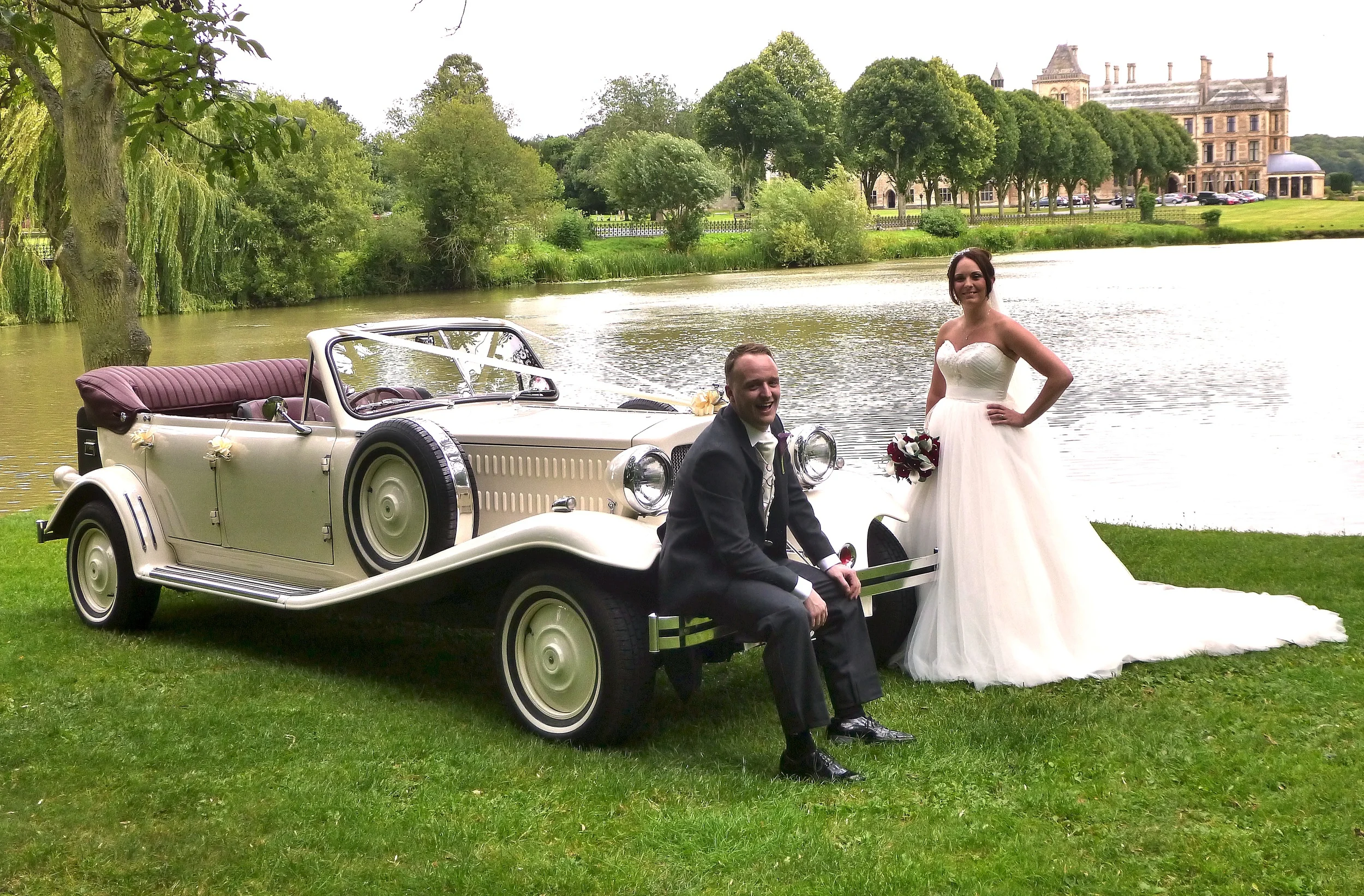 Tiffany and Lewis enjoying a few minutes together "posing" for www.anievansphotography and me! This is one of my favourite wedding venue views.
