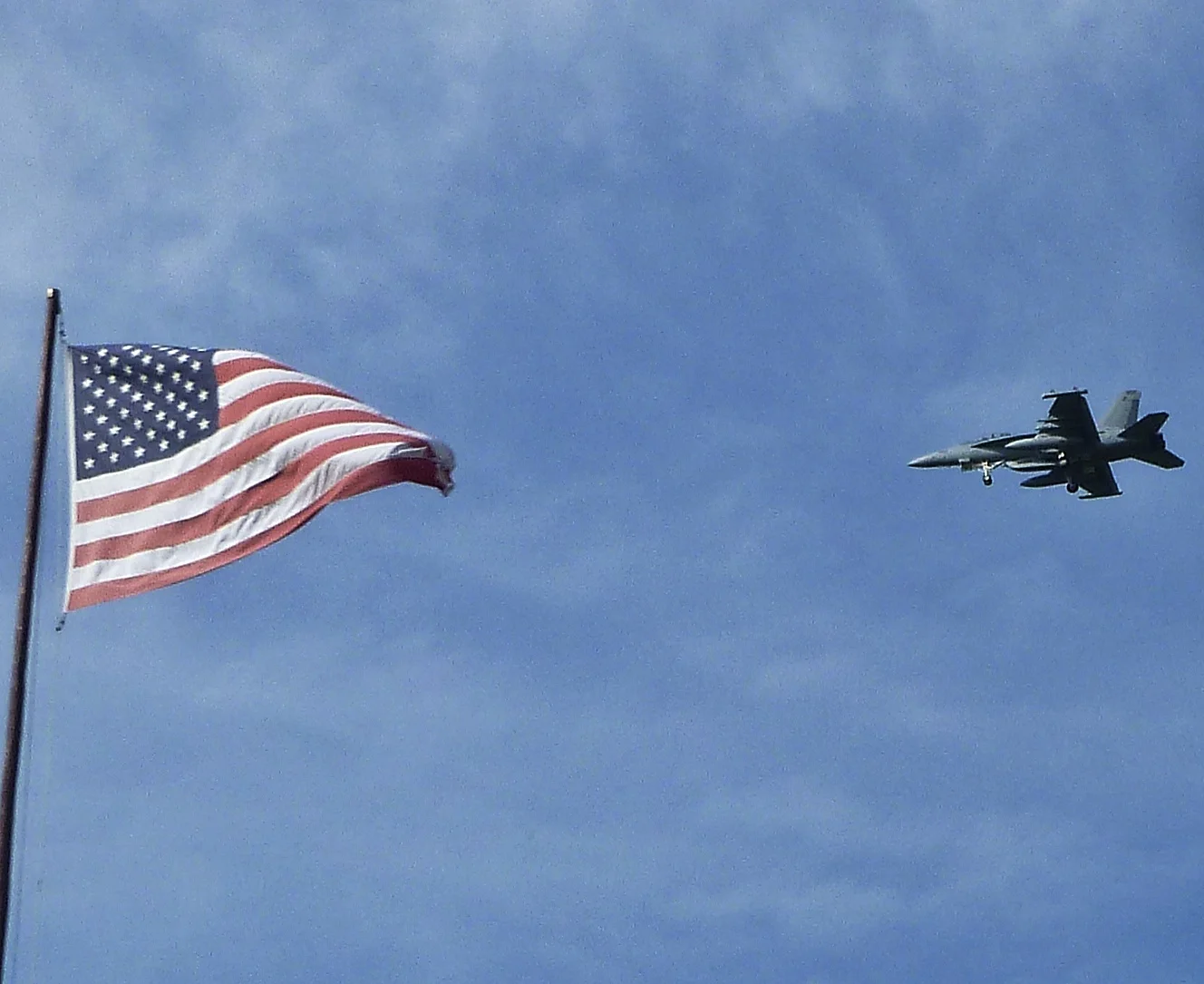 Hope he misses the flag! £44 million of Growler EA18 Jet on another training flight over the Island.