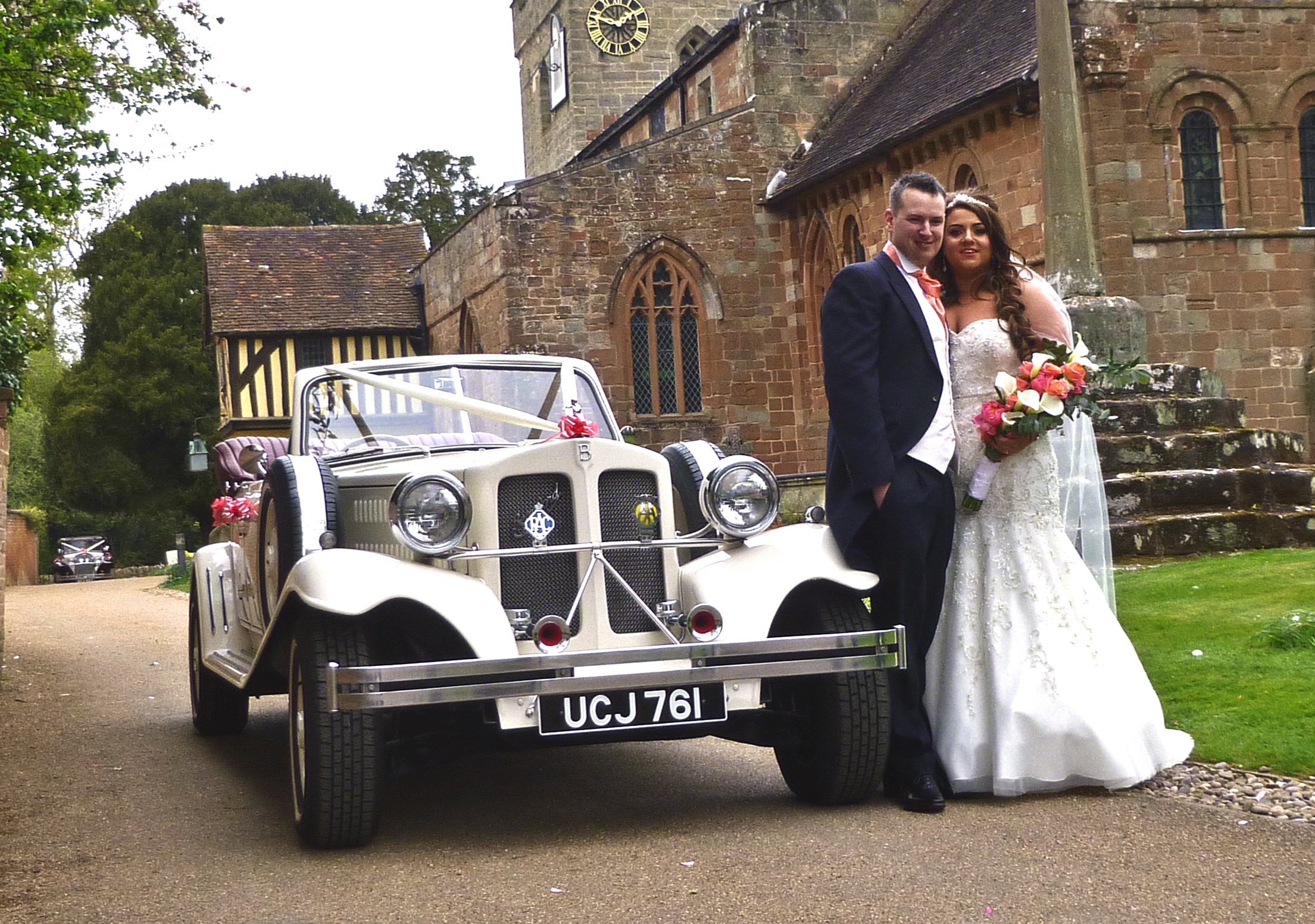 Mandy and Barrie braving a rather cold day but enjoying every minute. The Badsworth can be spotted patiently waiting with the Bridesmaids, keeping warm whilst the photos were taken!