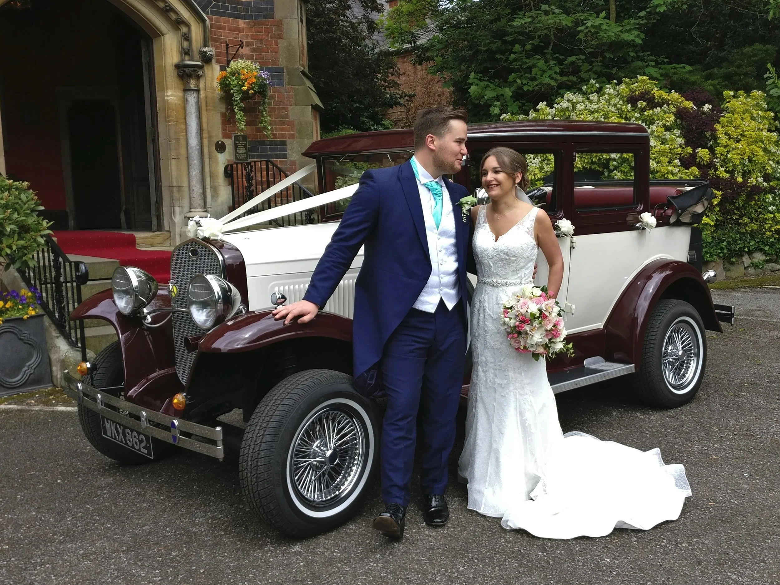Rebecca and Peter arrive at Brownsover Hall, Rugby following our country drive through Monks Kirby and Pailton which allowed most of the guest to be waiting for our arrival. A lovely occasion for the happy couple. By the way the weather "window" closed 5mins after the Badsworth was back in the garage!