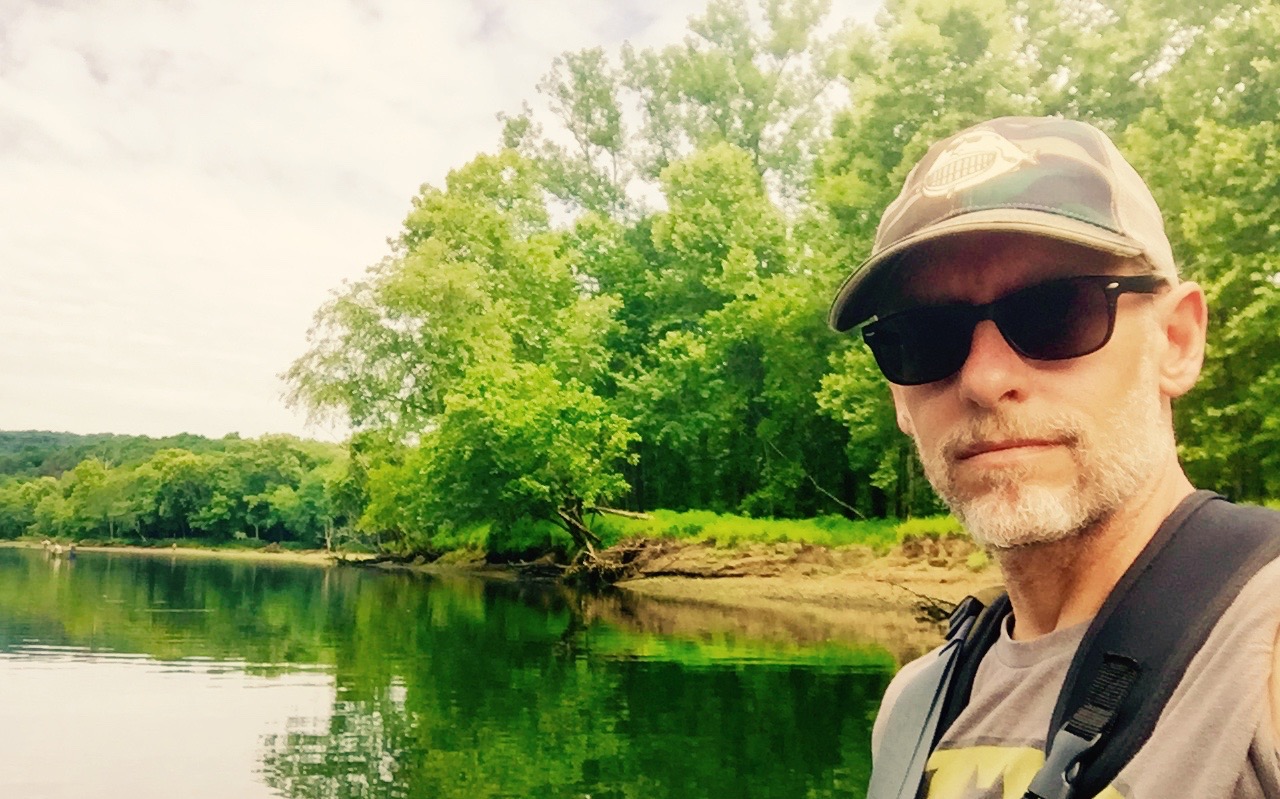 Troy Thomas (founder of Fish Face, a brand of outdoor clothing) fly fishing the Caney Fork
