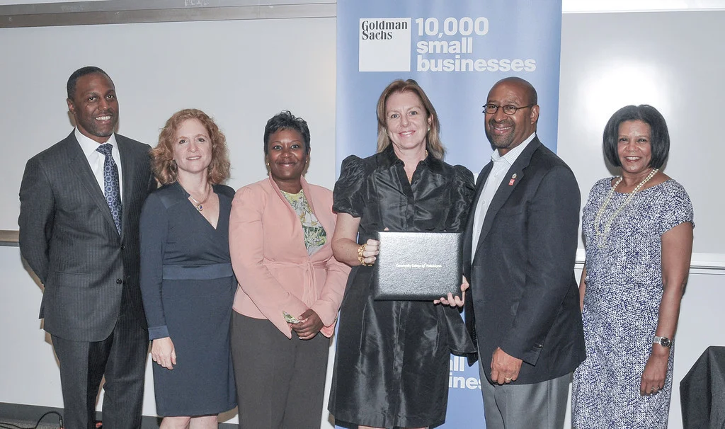 Starr Osborne receiving her Goldman Sachs 10,000 Small Businesses diploma from Mayor Nutter, September 2013.
