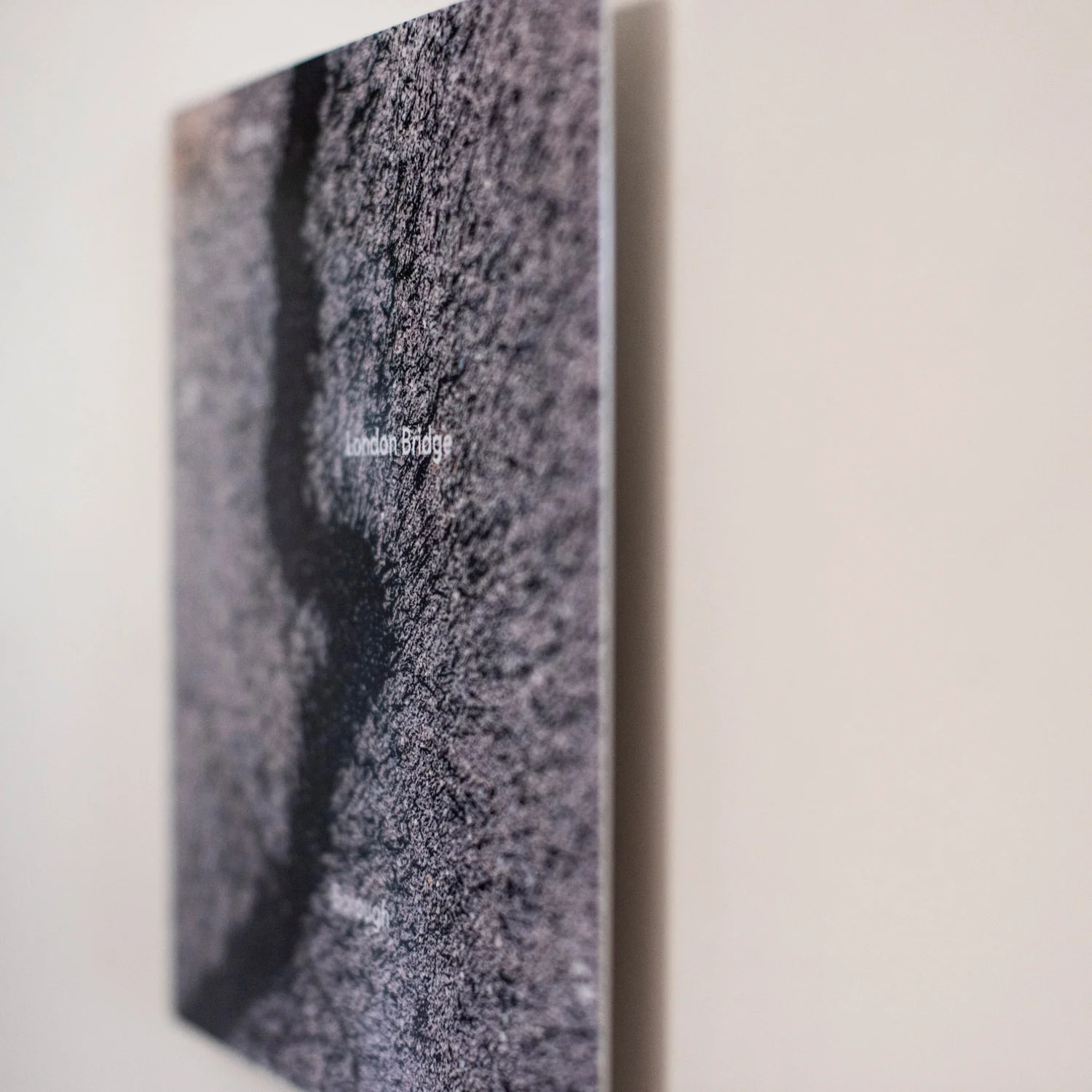 Aluminium panel, sitting half inch off the wall