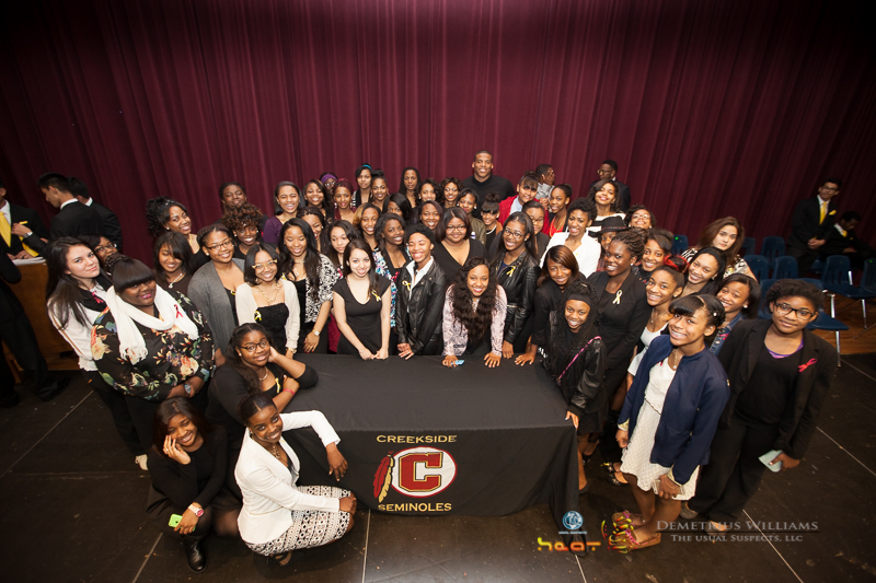 Y2L2 mentors and mentees with Cam Newton