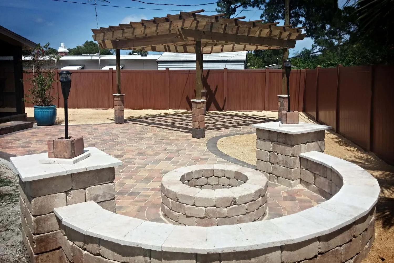 pavers pergola firepit travertine .jpg