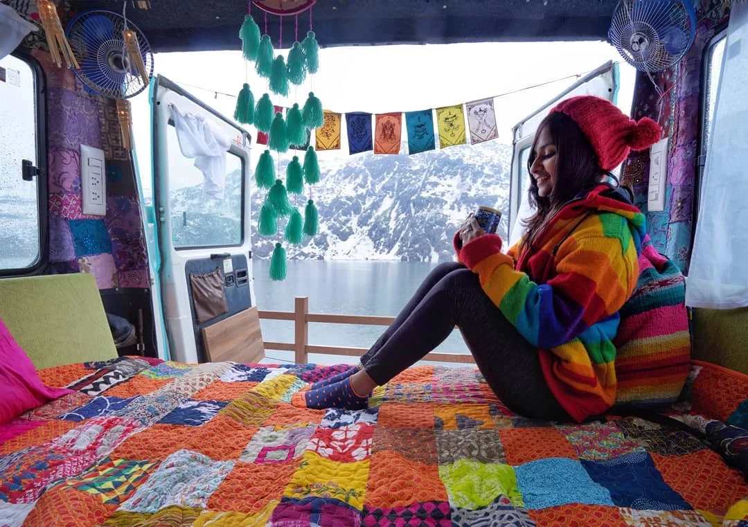 trulynomadly We've finally hit the snowy parts of Sikkim! So dreamy and picturesque, East Sikkim has been a revelation! The people are so warm and simple and the peaks so cold and white. As we drove our bright blue Luna through the trippy Dzuluk Loops and into the charming village at Gnathang Valley, my heart skipped so many beats. I feel so goddamn blessed to be traversing this gorgeous region in a caravan! Even though the drive through the famous Baba Mandir and Tsomgo Lake turned out to be a tad underwhelming with tons of people riding yaks and trashing the place, I'm so glad we had this languid moment to ourselves right by the lake. Some hot tea and a view to die for. All inside our home on wheels, isn't she cozy? 😍 📸 @cpproductions17