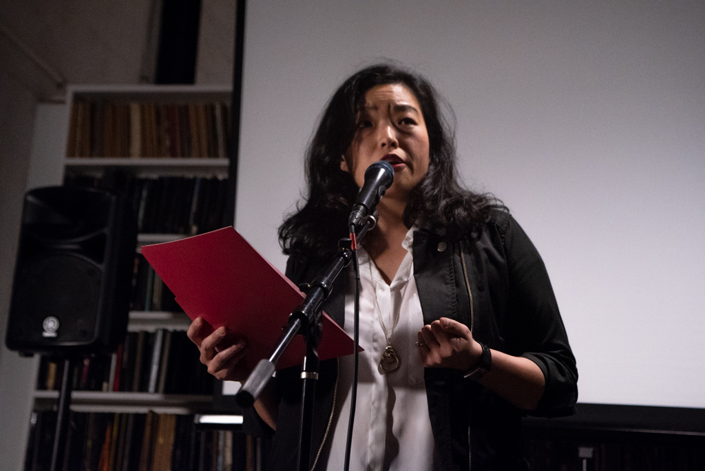 Patricia reading her essay at the Burn The Book premiere on April 19. Photo by Bridget Haggerty. 