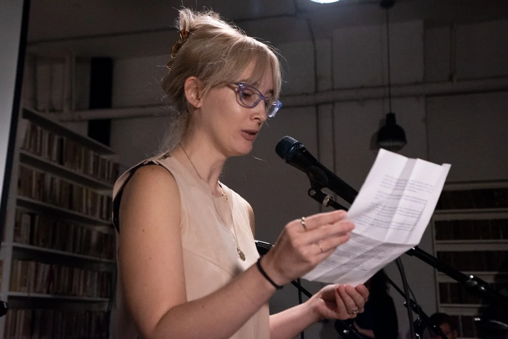 Jenny reading her essay at the Burn The Book premiere on April 19. Photo by Bridget Haggerty.