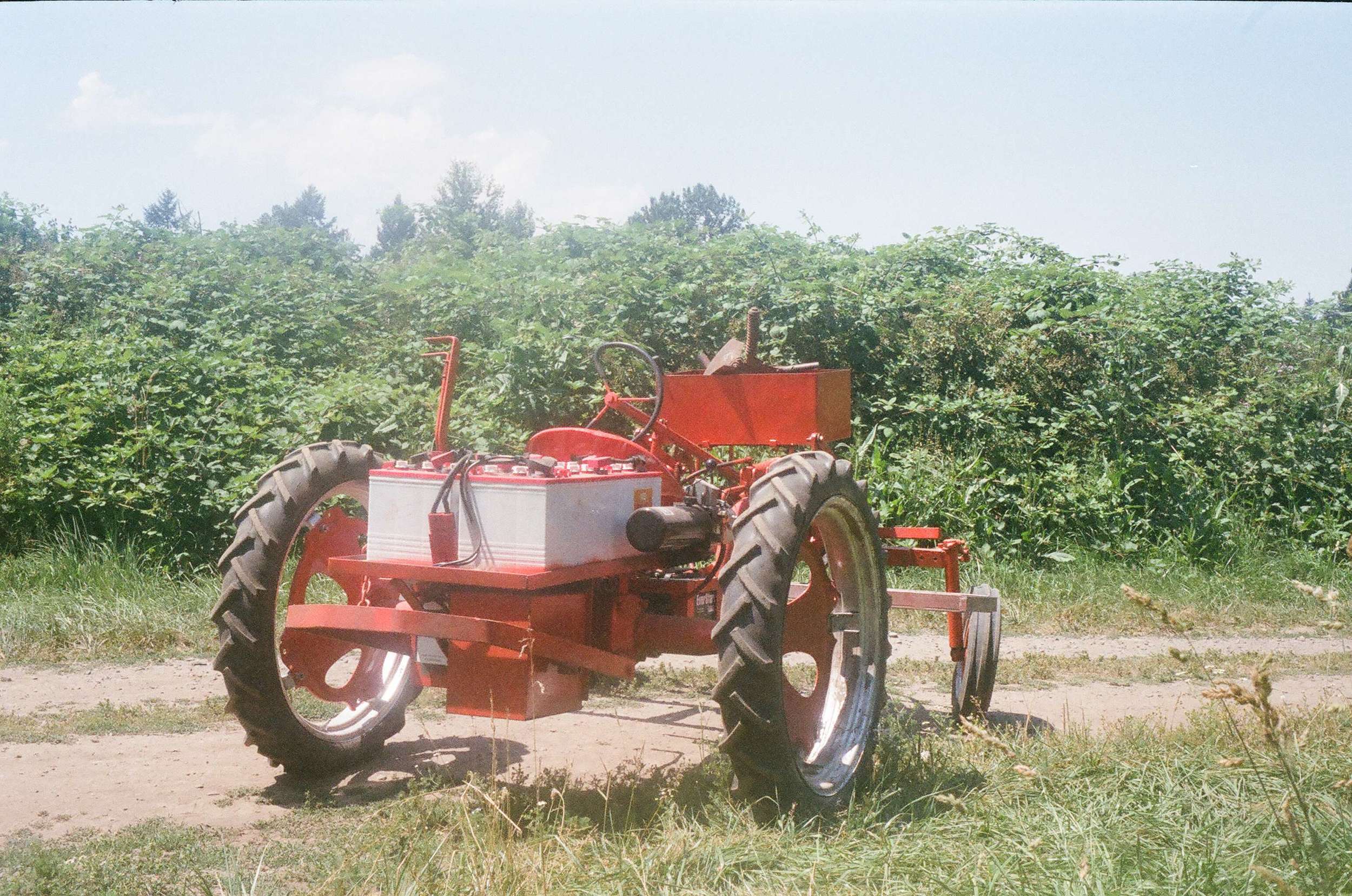 A 1950's era gas powered Allis Chalmers Model G has been converted to run off of a bank of batteries.