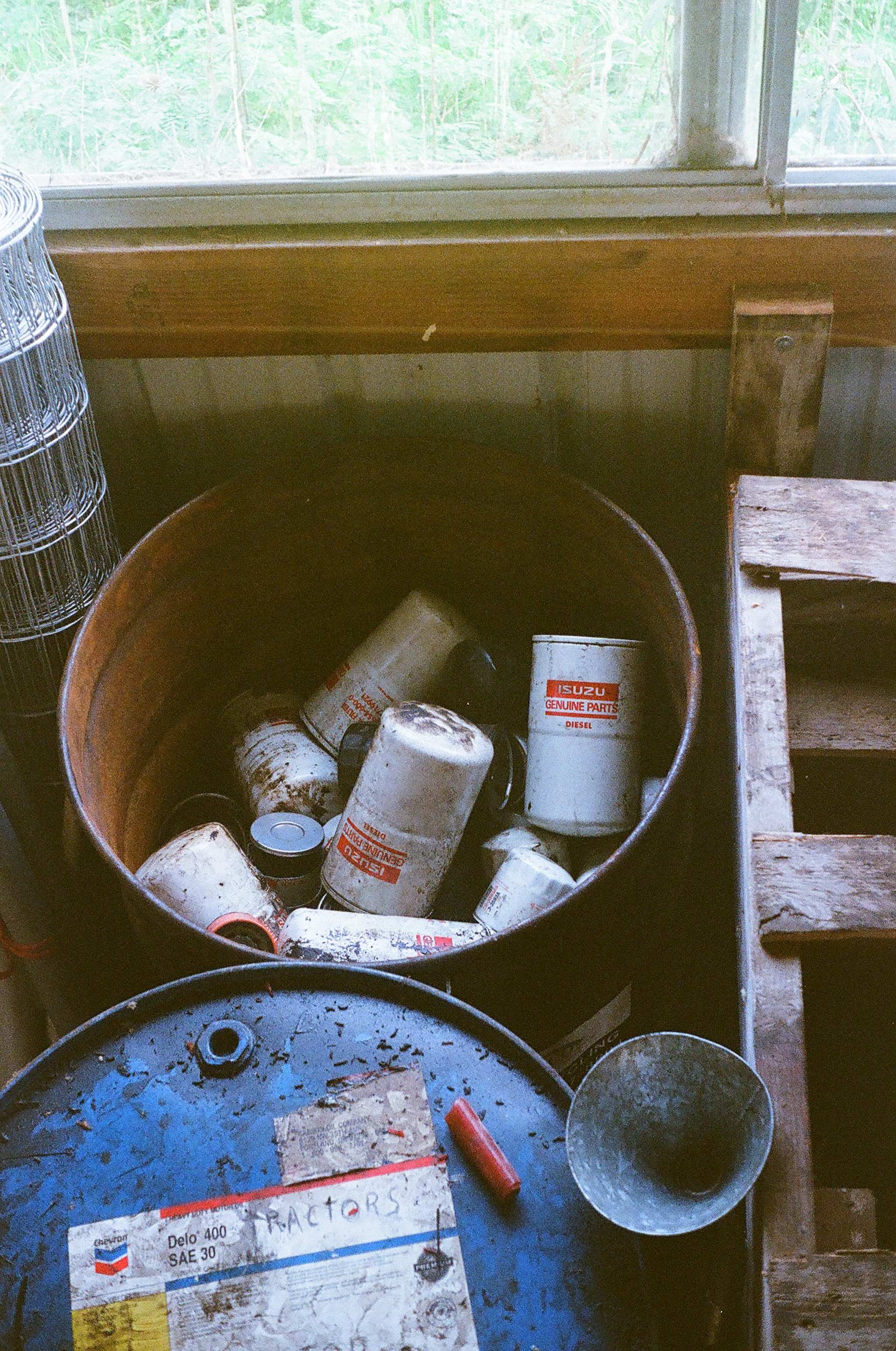  Used oil filters are stored in a barrel before being transported to a Portland company that separates and recycles the steel, paper, and oil in the filters. It takes ten years to fill this barrel! 