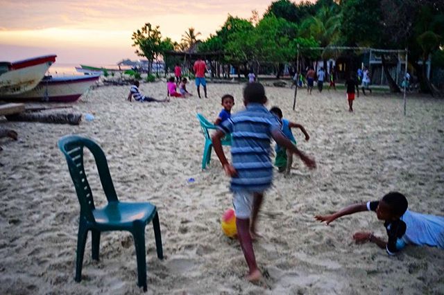 Aggressive game of chair futbol at sunset