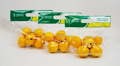 Nature's Partner Meyer lemons pictures in 1-lb. handle bags. Click to download high resolution image.