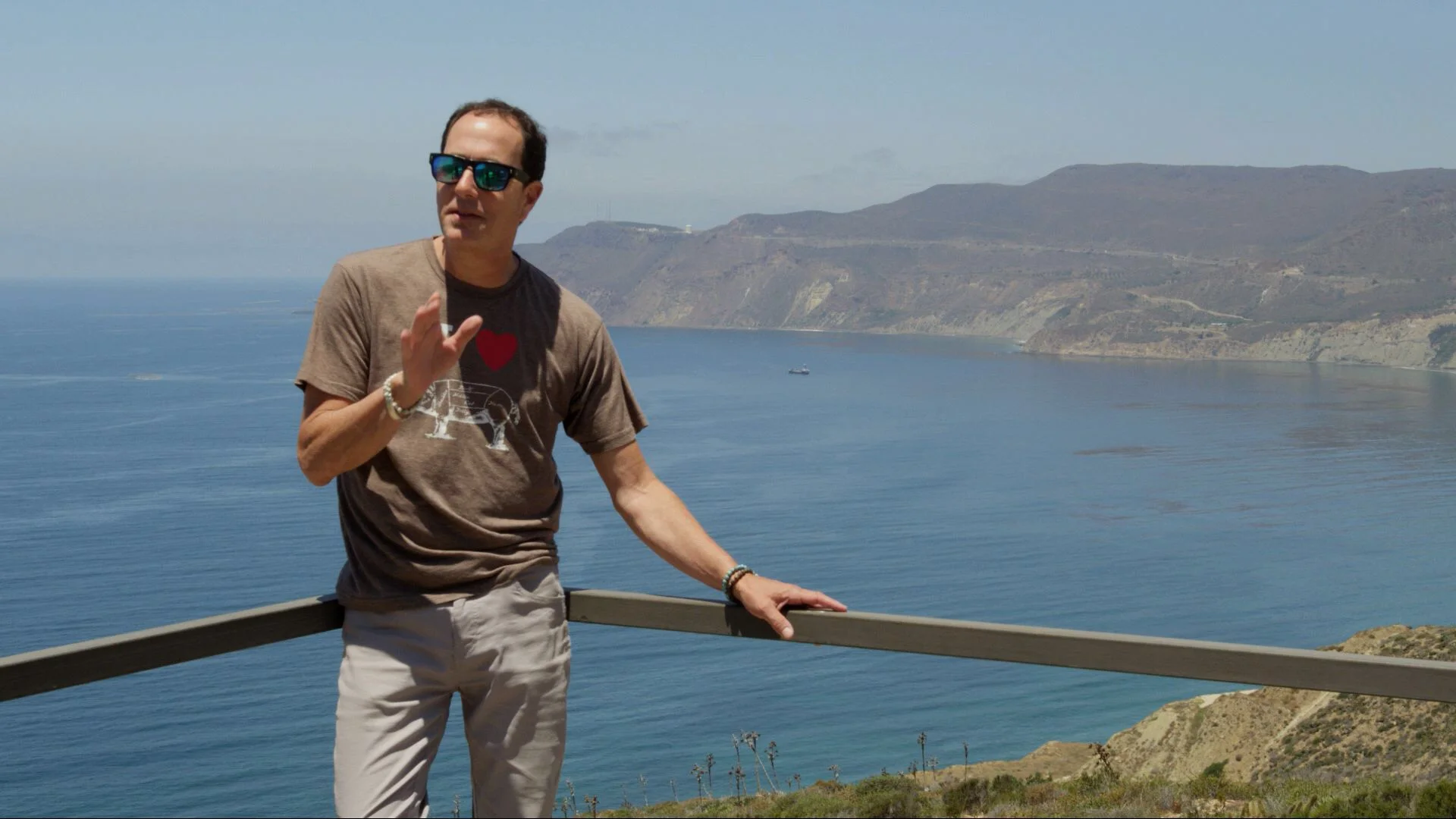 Sam at Cuatro Cuartos vineyard overlooking Ensenada